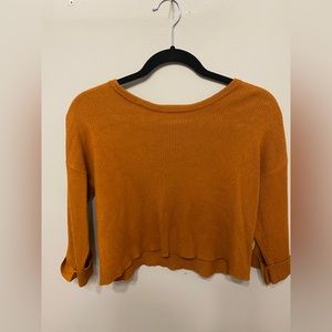 Orange knit cropped top
